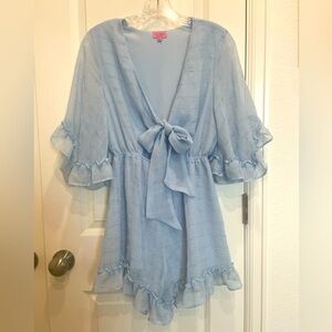 Ruffle Babydoll Light Blue Tie Front Romper from Francesca’s